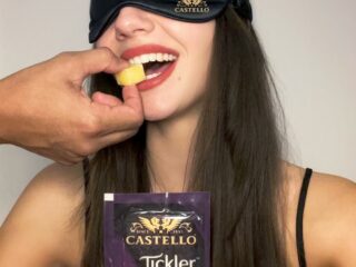 'Tickler' Your Senses: Blindfolded Woman Being Fed Cheese